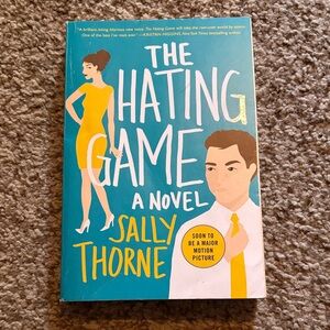 The Hating Game Novel by - Blue Cover